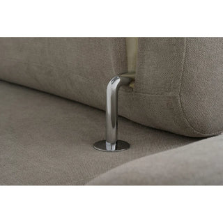 Close-up of a silver metal leg on the PF Sofas SOFAINSTORE Ferrano Beige Fabric Corner Sofa Bed, showcasing its modern L-shaped design and textured fabric.