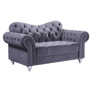 The Jubilee Grey Velvet 2 Seater Sofa by Beehive Furniture features elegant button-tufting, rounded arms, silver nailhead trim, and short silver legs—an ideal modern Chesterfield piece for your living room.
