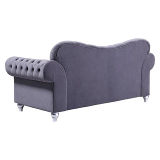 The Jubilee Grey Velvet 2 Seater Sofa by Beehive Furniture features a curved backrest, button-tufted rolled armrests, and short silver legs—an elegant modern piece for your living room.