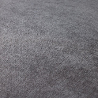 Close-up of a soft, gray fabric surface with subtle texture, echoing the elegant upholstery and button-tufted arms of the Beehive Furniture Windsor Fullback Grey Corner Sofa (Left Hand Facing).