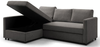 The Kyoto Clara Grey Fabric Corner Sofa Bed features a pull-out design, hidden storage in the chaise lounge, and three back cushions—combining modern style and functionality for any living space.