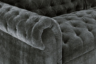 Close-up of the Jubilee Charcoal Grey Velvet Sofa by Beehive Furniture—a 3-seater featuring button-tufted details and rolled arms, adding elegance to any living room.
