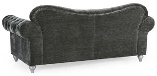 The Jubilee Charcoal Grey Velvet Sofa by Beehive Furniture is a 3-seater in classic Chesterfield style with button-tufted rolled arms, a curved backrest, and short light gray legs—a refined addition to your living room.