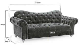 The Jubilee Charcoal Grey Velvet Sofa by Beehive Furniture is a 3-seater with button-tufted design, rolled arms, and four short legs. Measuring 220cm W x 90cm H x 86cm D, it’s a stylish addition to any living room collection.
