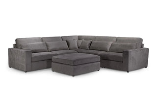The Beehive Furniture Kiana Modular Sofa in grey fabric features a large corner design, soft upholstery, and matching cushions, offering flexible modular seating to suit any living space.