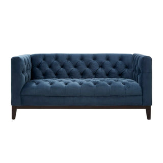 The Okab Velvet 2 Seater Sofa by Premier Sofas features a midnight blue finish, high back and sides, deep button details, and dark wooden legs—shown here against a white background for stylish elegance.