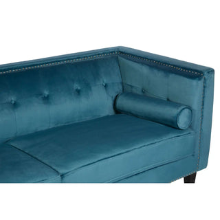 The Premier Sofas Felisen Upholstered Velvet 3 Seater Sofa in Blue Elegance features a button-tufted backrest, silver nailhead trim, and a matching bolster pillow—an elegant and sturdy addition to your living room.