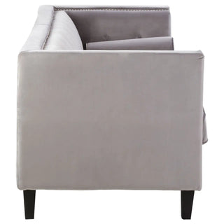 Side view of the Felisen Grey Velvet 3 Seater Sofa by Premier Sofas, featuring a button-tufted backrest, straight armrests, black legs, and a matching cushion—ideal for those seeking elegant sofas online in the UK.