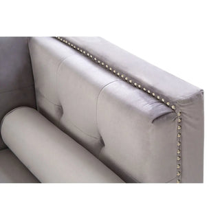 Close-up of the Felisen Grey Velvet 3 Seater Sofa by Premier Sofas, featuring an elegant button-tufted backrest, silver nailhead trim, and a bolster pillow—ideal for luxe UK homes.