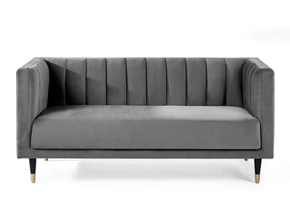 The Julian Bowen SOFAINSTORE Savona Grey Velvet Fabric 2 Seater Sofa features luxe modern style, channel-tufted back, straight arms, and gold-tipped legs. Photographed front-on against a plain white background.