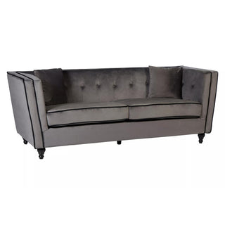 The Hannah Upholstered Velvet 3 Seater Sofa by Premier Sofas features a chic grey finish, straight arms, button-tufted backrest, black trim, two seat cushions, matching throw pillows, and stands on short dark wooden legs.