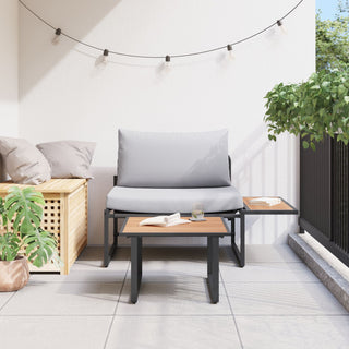 A stylish outdoor patio showcases the vidaXL SOFAINSTORE 2 Piece Garden Armchair Set with light grey cushions and black frames, a coffee table, and bench accented by potted plants, string lights, and cozy sunlight.