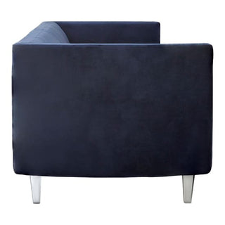 The Modern Dark Blue Velvet 3 Seater Sofa by Premier Sofas features a stylish design with squared edges and acrylic legs, making it perfect for contemporary living rooms.