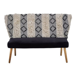 The Nestium FURCO Boho-Inspired 2 Seater Sofa features black velvet upholstery, mango wood legs, a high backrest, and a cream-and-black geometric pattern for a chic, modern look.
