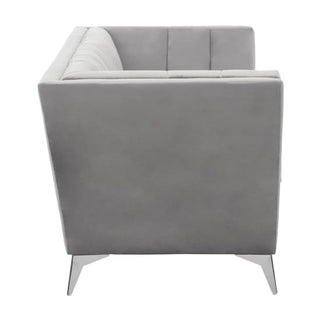 Side view of the Hefei Velvet 2 Seater Sofa by Premier Sofas, upholstered in grey fabric with tufted backrest and angled chrome metal legs—a stylish modern addition to your living room.