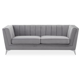 Elevate your living room with the Premier Sofas Hefei 3 Seater Sofa in grey velvet, featuring a chic vertical tufted backrest and chrome metal legs for a modern touch.