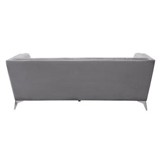 The Hefei 3 Seater Sofa by Premier Sofas boasts chic design in grey velvet, a flat backrest, and angled chrome metal legs—ideal for any modern living room.