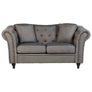 The Nestium SOFAINSTORE Kensington Grey Fabric Chesterfield Sofa is a 2-seater with scroll arms, button back, and studded detail—an elegant choice for any space.