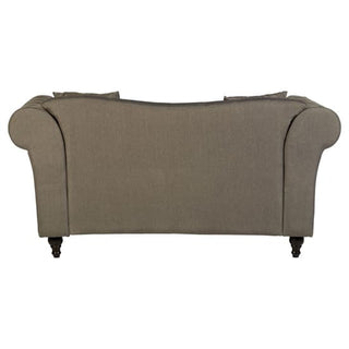 The Nestium SOFAINSTORE Kensington Grey Fabric Chesterfield Sofa – 2 Seater features scroll arms, a button back, and studded detail, combining classic elegance with comfort.