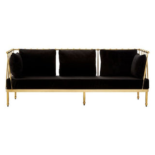 The Premier Sofas Kurhah Black Velvet 3 Seater Sofa features a gold tapered frame, plush cushions with three back pillows and two cylindrical side pillows, shown from the front on a white background.