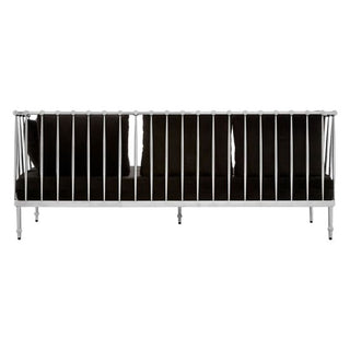 The image shows the Nestium Black Velvet Fabric 3 Seater Sofa from the back, featuring a silver frame with vertical bars and plush black seat and back cushions for luxurious comfort.