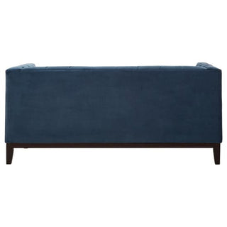 The Okab Velvet 2 Seater Sofa by Premier Sofas features a rectangular design in midnight blue, plush velvet upholstery, clean lines, and short dark wooden legs—perfect for adding modern elegance to your space.
