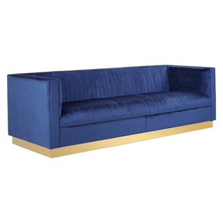The Deep Blue Velvet 3 Seater Sofa by Premier Sofas features vertical tufting, boxy arms, and a striking gold base for an elegant, modern look.