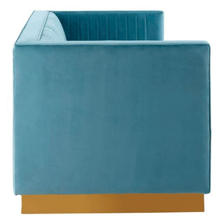 Side view of the Premier Sofas Contemporary Light Blue Velvet 3 Seater Sofa, featuring a tufted backrest and gold base, displayed against a white background.