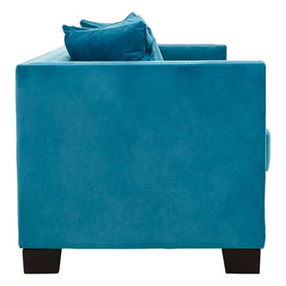 Side view of the Premier Sofas Pipirima Upholstered Velvet 2 Seater Sofa in cyan blue fabric, featuring plush cushions and black square legs, set against a white background.