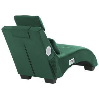 The Beliani SOFAINSTORE Maestro Green Velvet Chaise Lounge features built-in Bluetooth speakers, a USB port, a padded headrest, and black legs in a sleek modern design, shown from the back and at an angle.