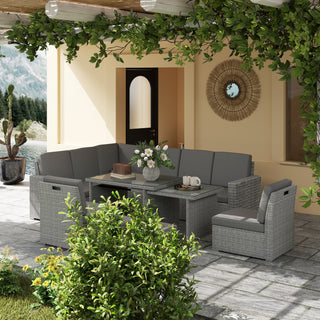 An outdoor patio features the Outsunny Seven-Piece Rattan Garden Sofa Set in light grey with plush cushions and an expanding table. Surrounded by greenery, a mirror decorates the yellow wall beneath a pergola draped with leafy vines.